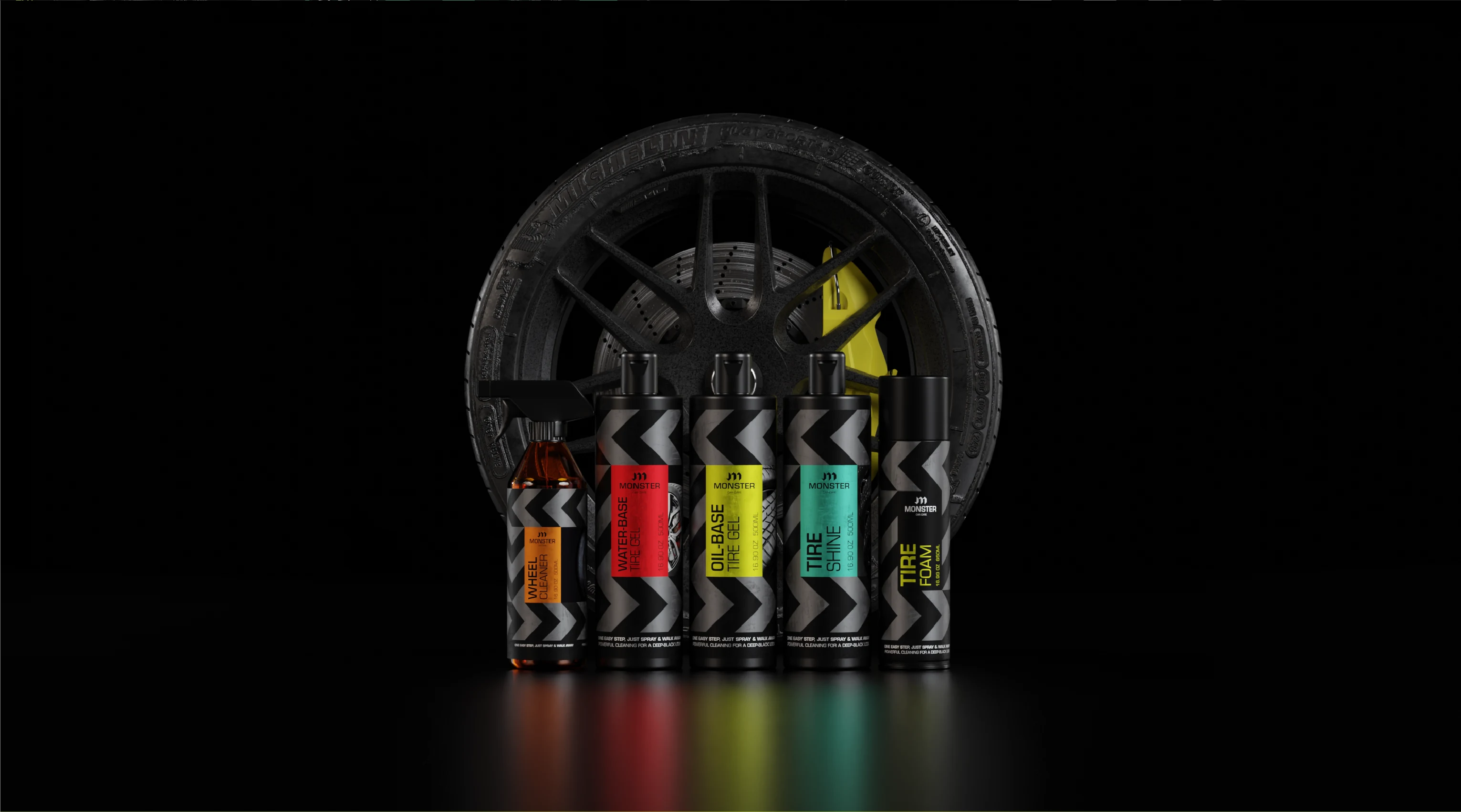Monster bottles in front of a tyre