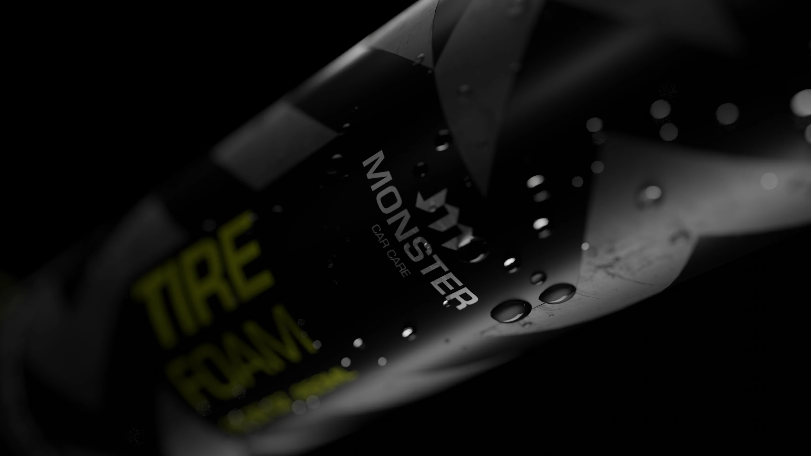 Close-up of a Monster tire foam bottle